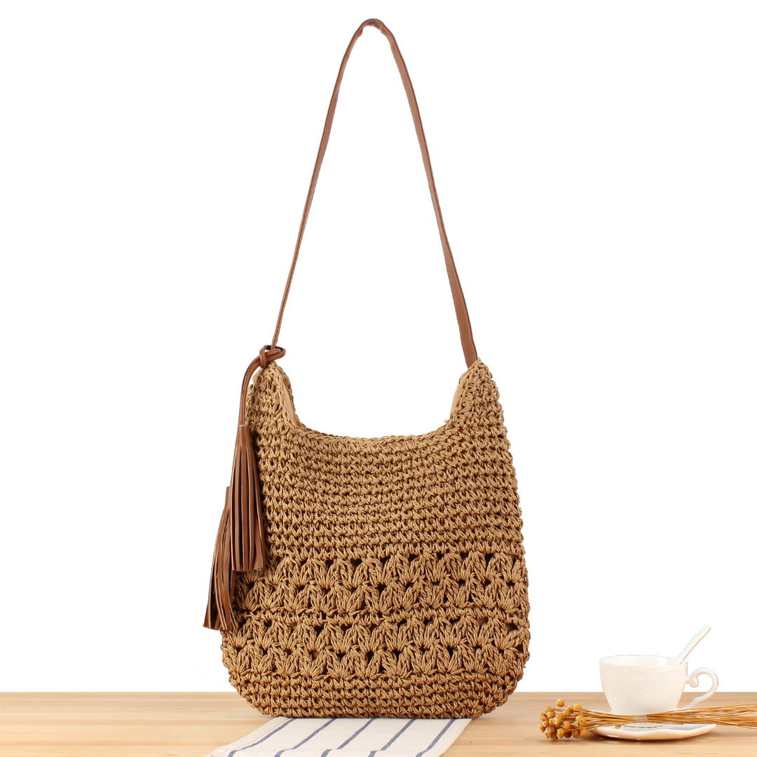 Shoulder bag made of hand-knotted natural material with fringed shoulder strap Bowlift