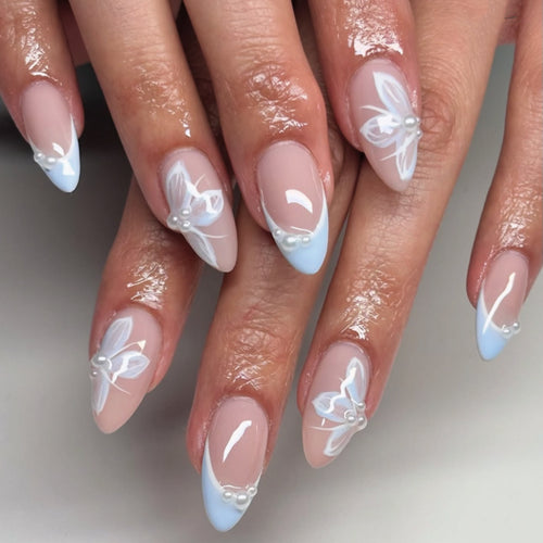 Elegant artificial nails with floral accents and glamorous design Bowlift