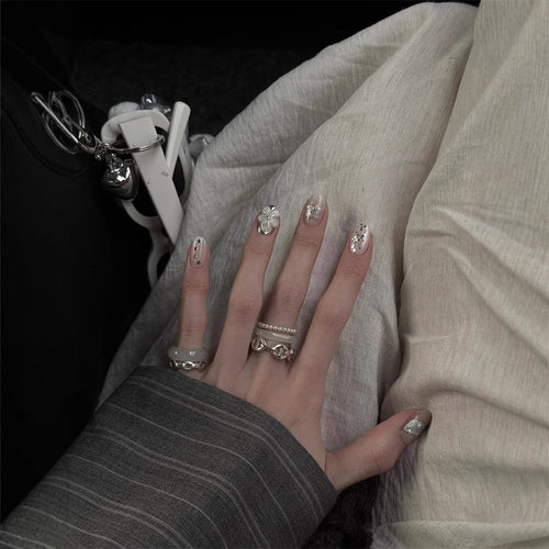 Artificial nails with decorative accents Bowlift