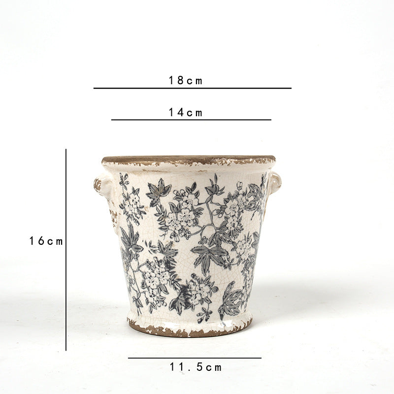 Decorative flower pot with floral embellishments Bowlift