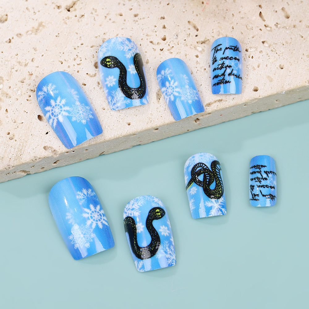 Creative art nails with snowflake and snake motif Bowlift