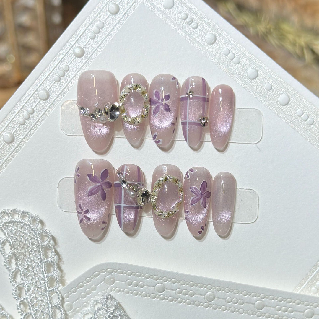 Artistic Press-On Nail Set with Floral Accents Bowlift