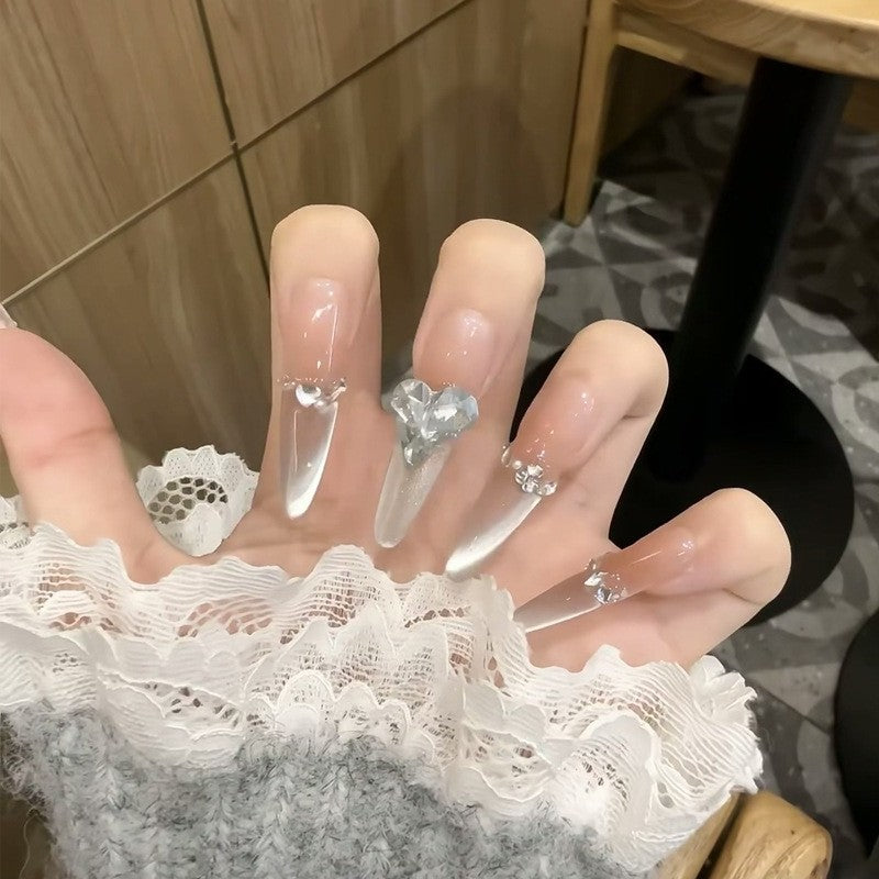 Artificial nail set with elegant tips and crystal accents Bowlift