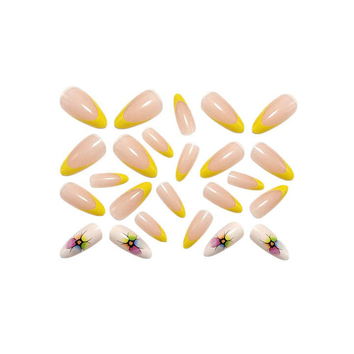 Stylish artificial nails with floral accents and colorful French tip design Bowlift