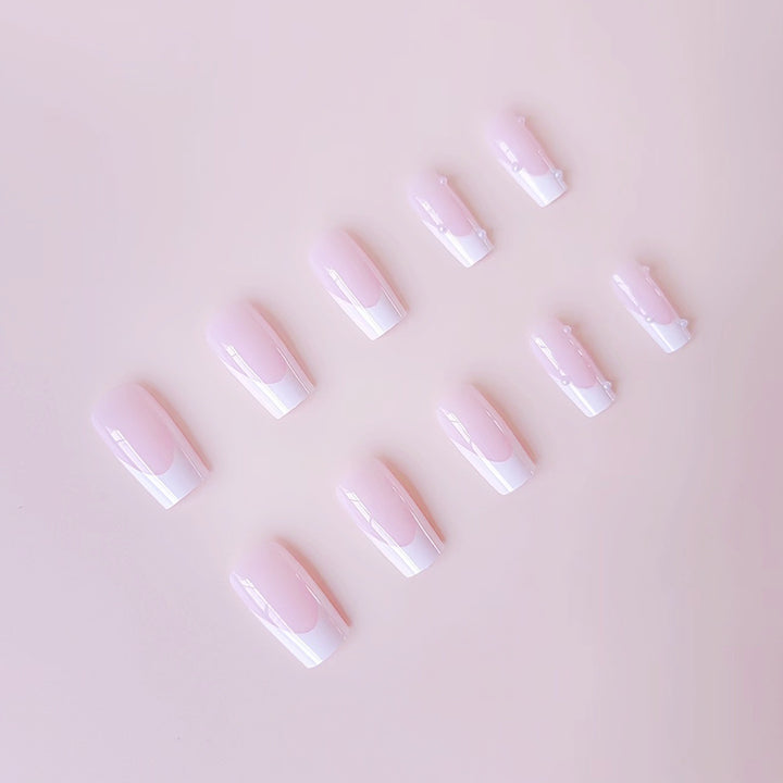 Artificial nail tips with elegant pearl accents Bowlift