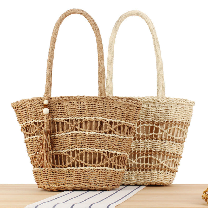 Hand-knotted shopping bag made of natural weave with elegant tassel decoration Bowlift