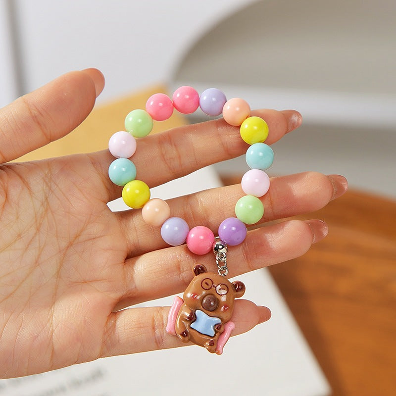 Colorful children's bracelet with crafted pendant Bowlift