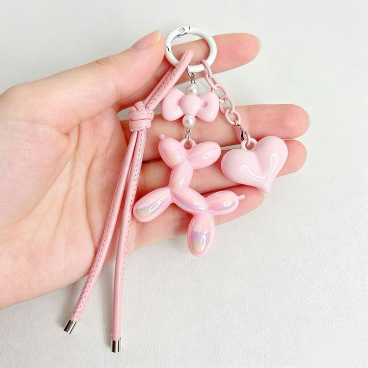 Playful keychain with heart and balloon dog Bowlift