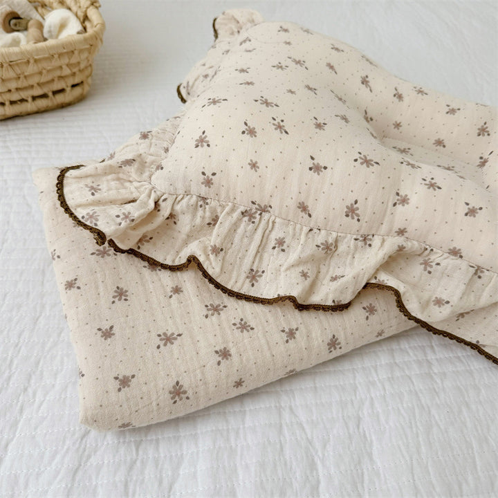Unisex Muslin Blanket with delicate floral design and elegant ruffles Bowlift