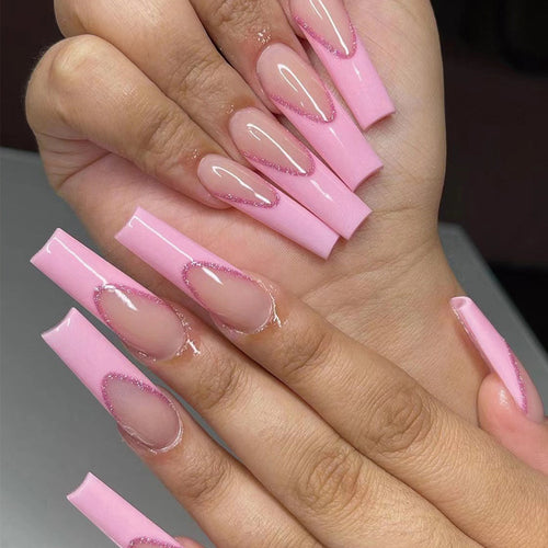 Artificial nail extensions with glitter decoration Bowlift