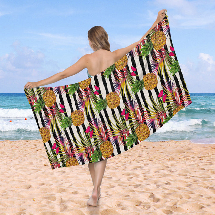 Beach towel with exotic pineapple and palm pattern Bowlift