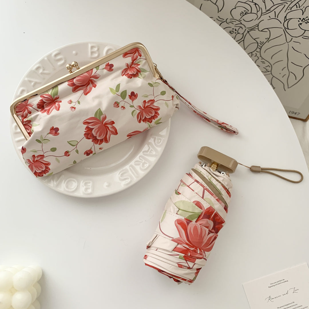 Ladies elegant folding umbrella with floral design and practical case Bowlift