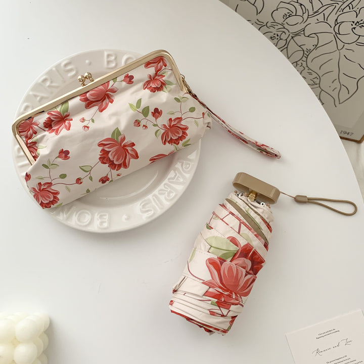 Ladies elegant folding umbrella with floral design and practical case Bowlift