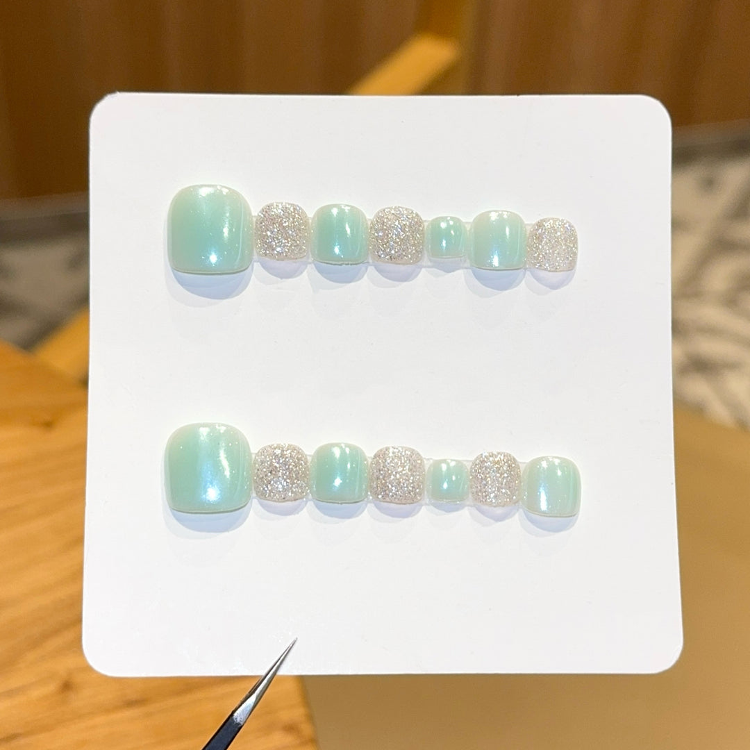 Acrylic nail set with glitter and pastel accent Bowlift