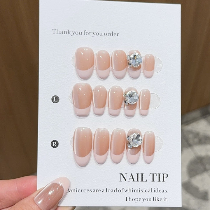 Artificial nail tips with elegant rhinestone accents Bowlift