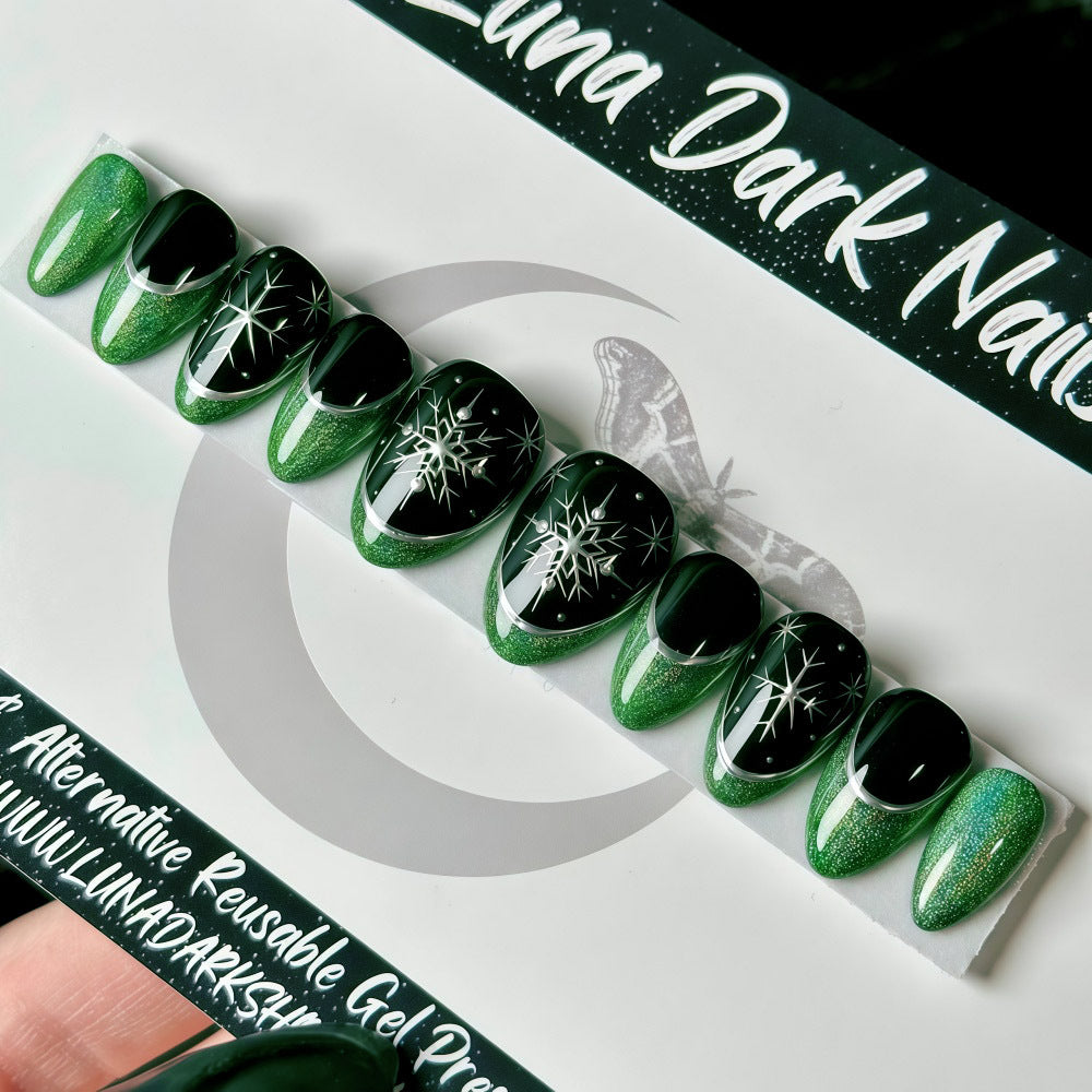 Glamorous artificial nails with intricate Christmas design Bowlift