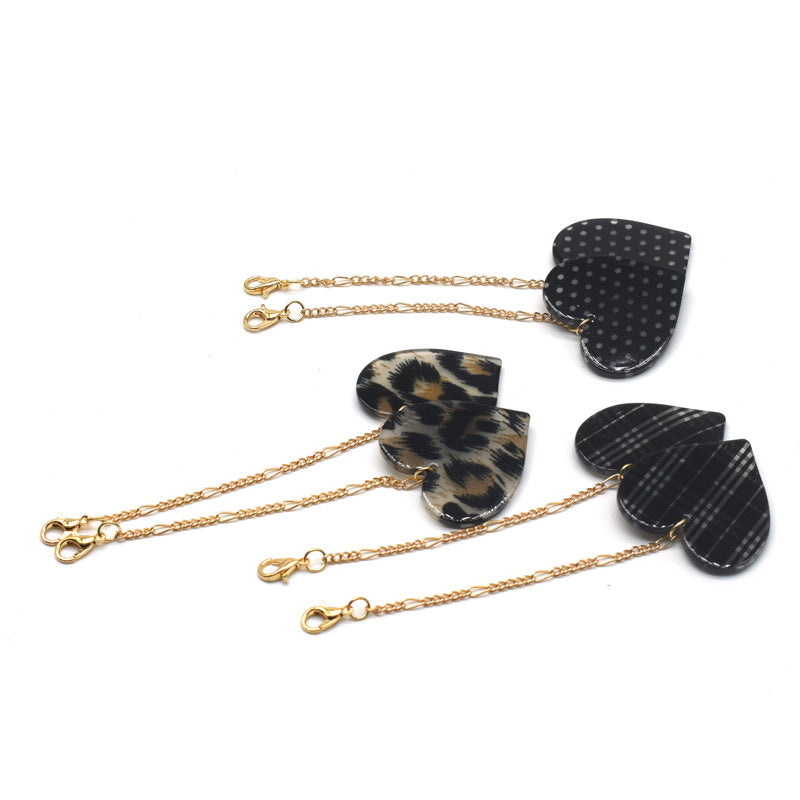 Heart-Shaped Dangle Earrings with Golden Chain Bowlift