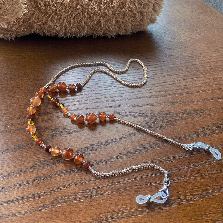 Stylish glasses holder chain with colorful accents Bowlift