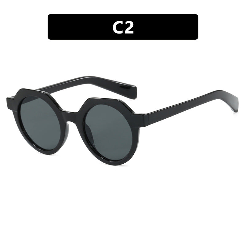 Ladies extravagant round sunglasses with colored accented frame Bowlift