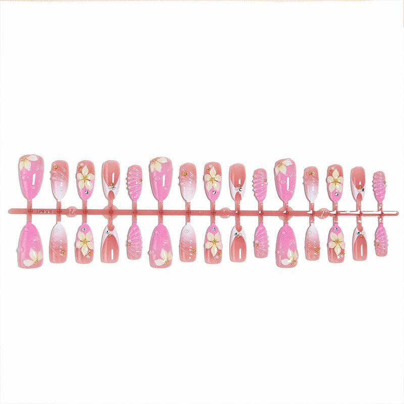 Nail art set with filigree flower patterns and sparkling accents Bowlift