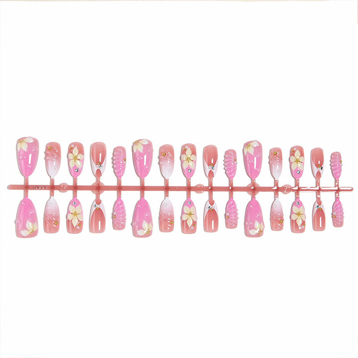 Nail art set with filigree flower patterns and sparkling accents Bowlift