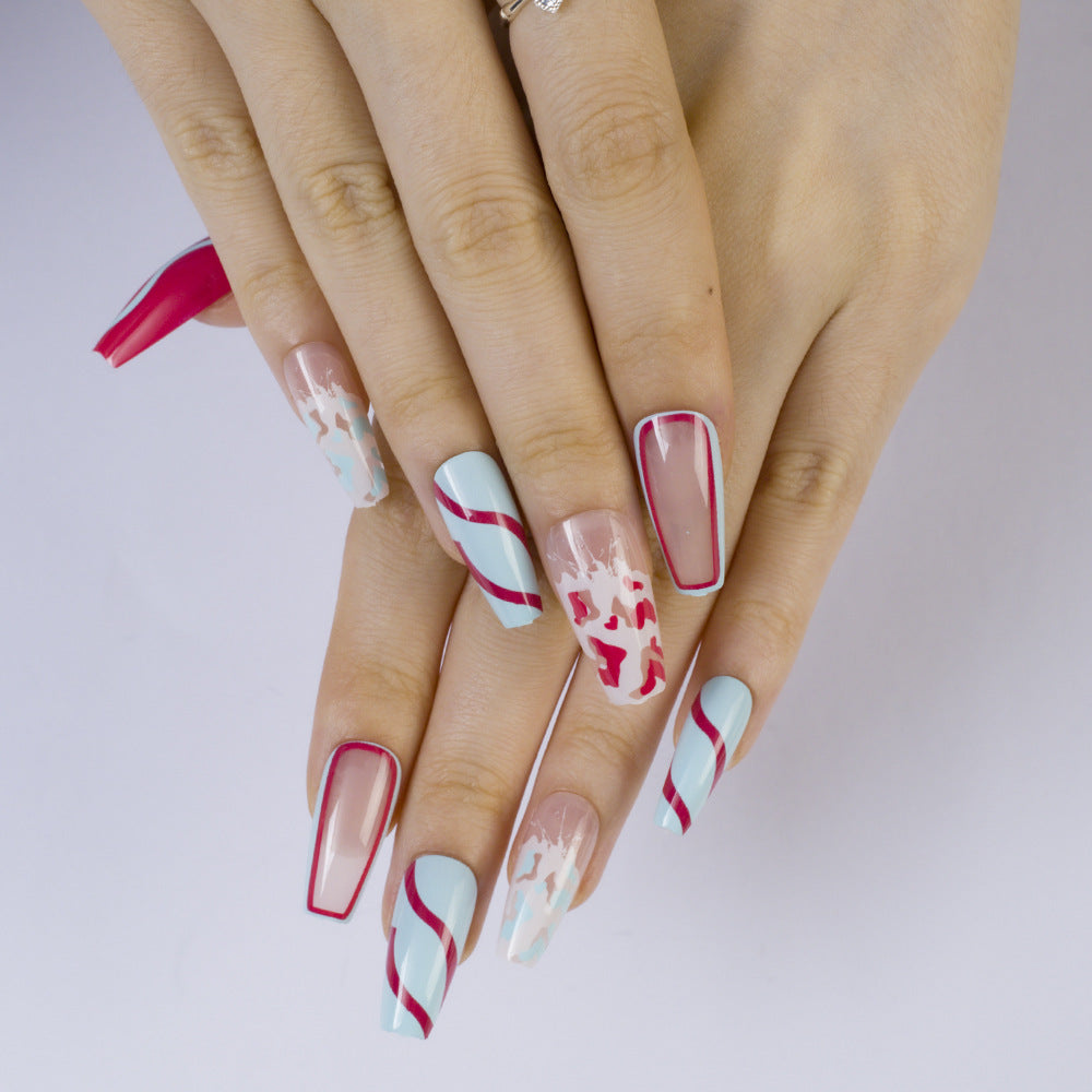Artificial nails with modern wave pattern and heart accents Bowlift