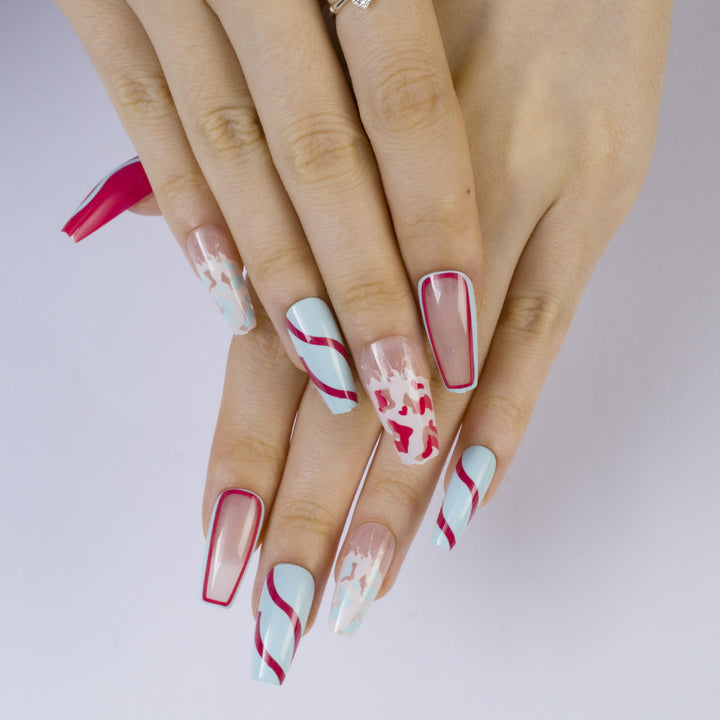Artificial nails with modern wave pattern and heart accents Bowlift