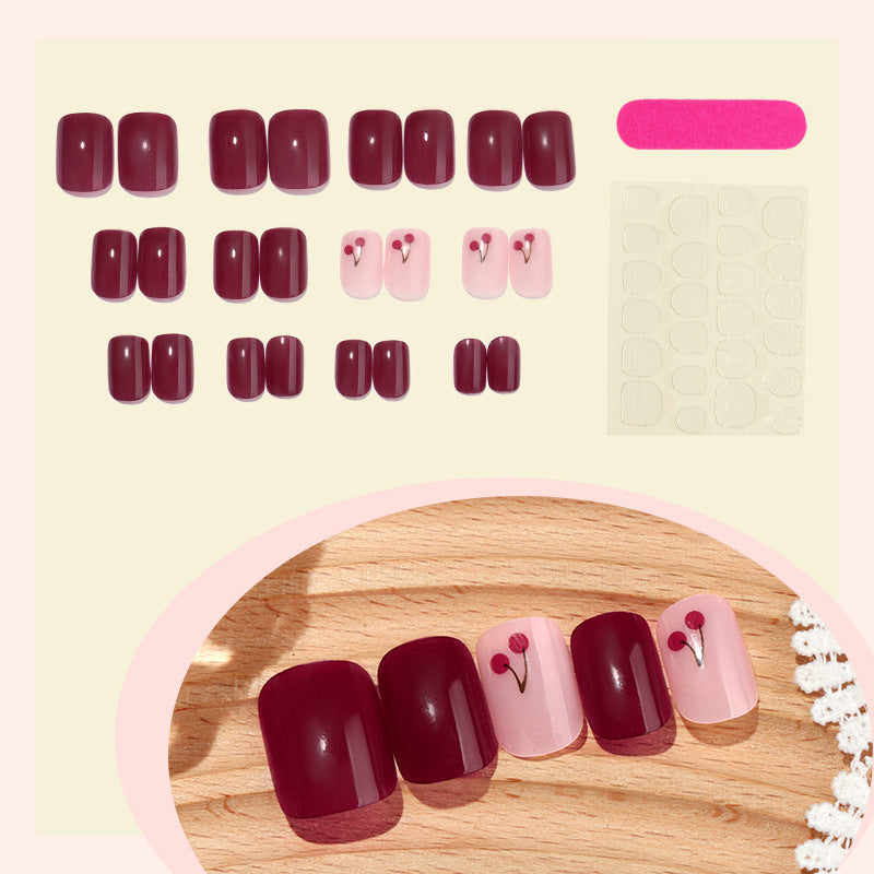 Elegant Press-On Nail Set with Cherry Accent Design Bowlift