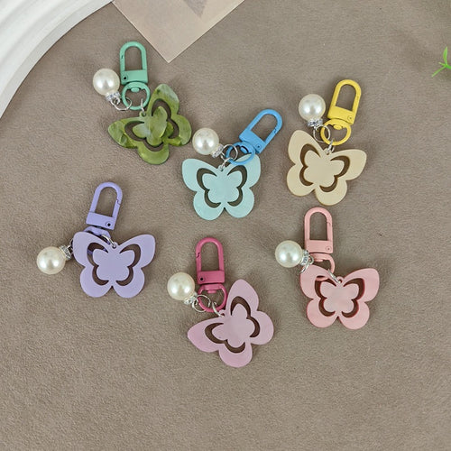 Keychain with butterfly and pearl accent Bowlift