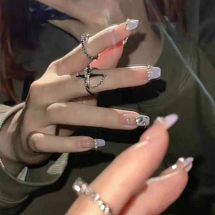 Artful nail design with glitter detail Bowlift