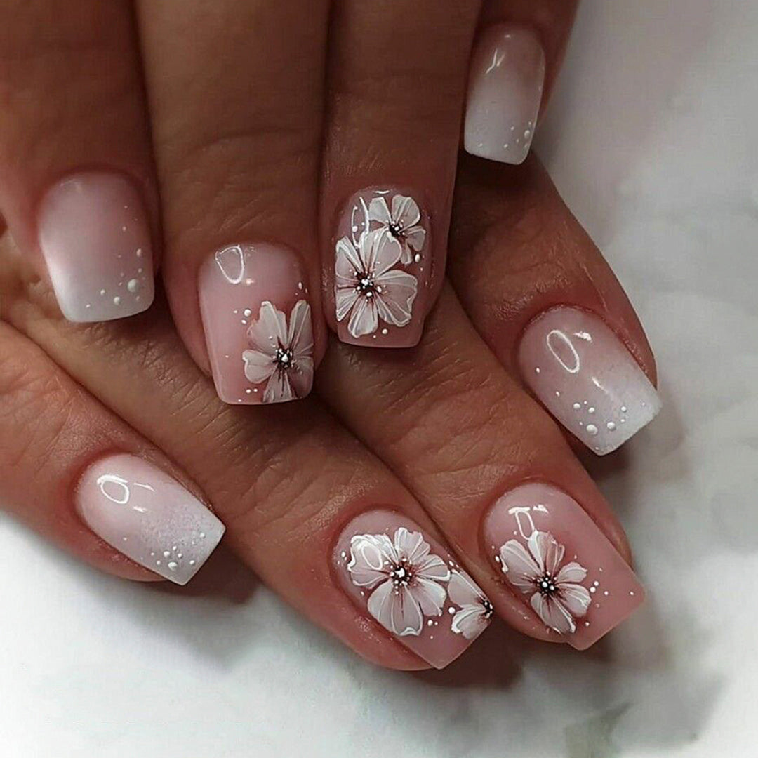 Artistic gel nails with floral decorations Bowlift