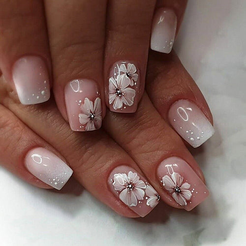 Artistic gel nails with floral decorations Bowlift