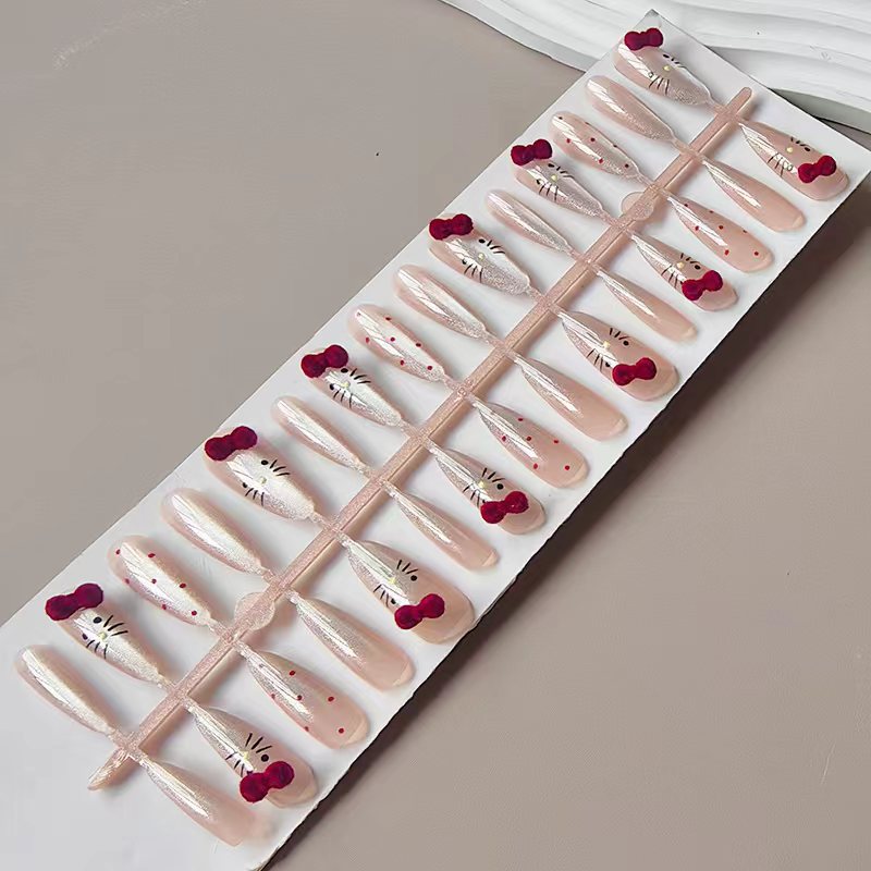 Artificial nails with playful Hello Kitty design Bowlift