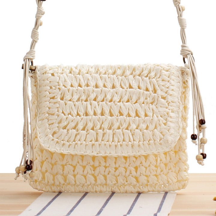 Braided Natural Material Handbag with Playful Fringes Bowlift
