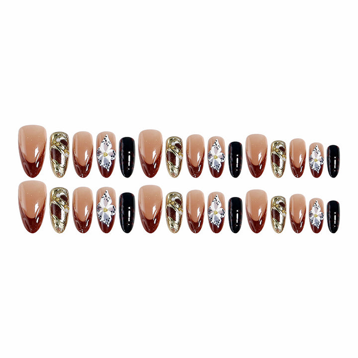 Artificial nail set with extravagant 3D design and elegant embellishments Bowlift