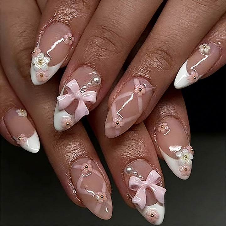 Artful Nail Tips with Ribbons and Floral Decorations Bowlift
