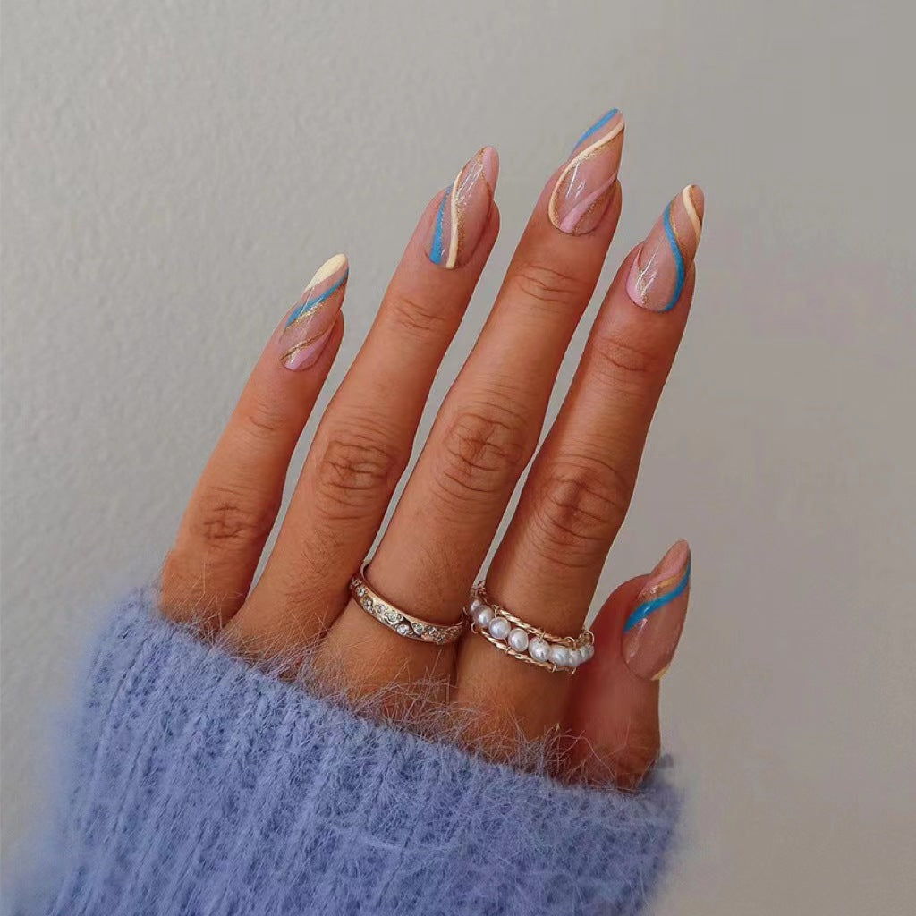 Artistic nail art with metallic accents and abstract designs Bowlift