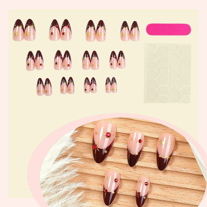 Elegant Pointed Press-On Nail Set with Decorative Accents Bowlift