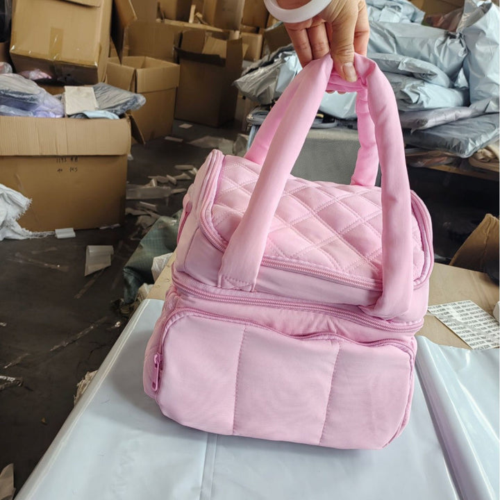Stylish cosmetic travel bag with multiple compartments Bowlift