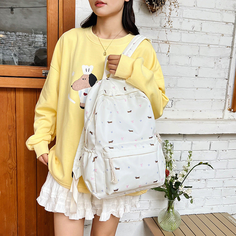 Backpack with Playful Dog Pattern Bowlift