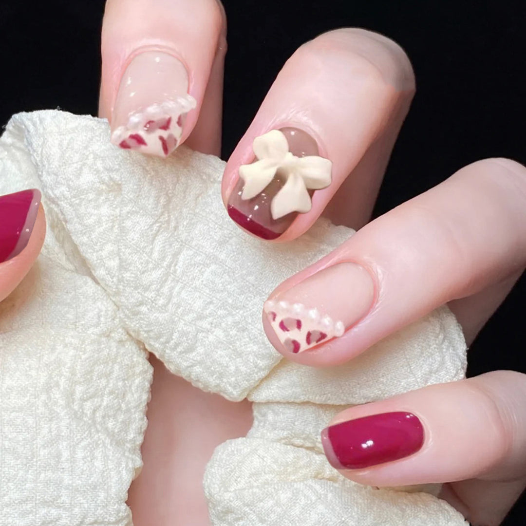 Artful nail art with elegant bow design Bowlift