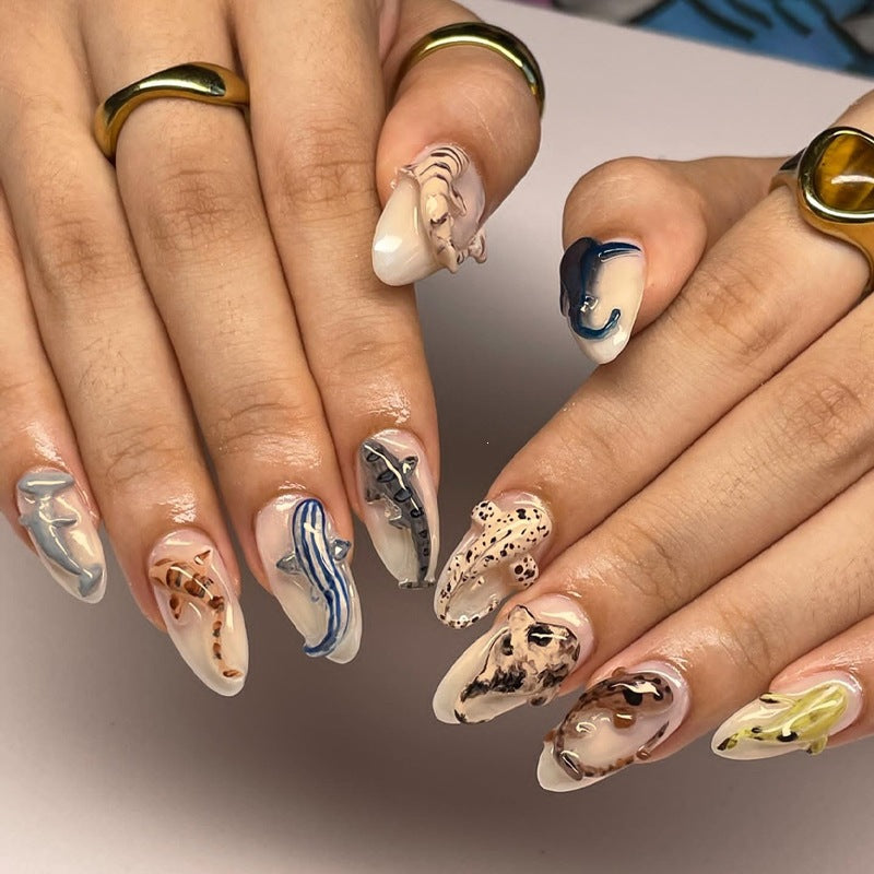 Creative nail art set with playful fish motifs Bowlift
