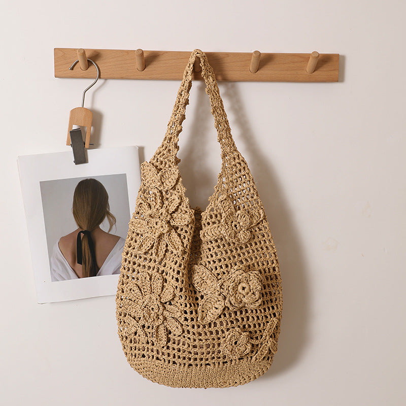 Crocheted shoulder bag with floral appliqués Bowlift