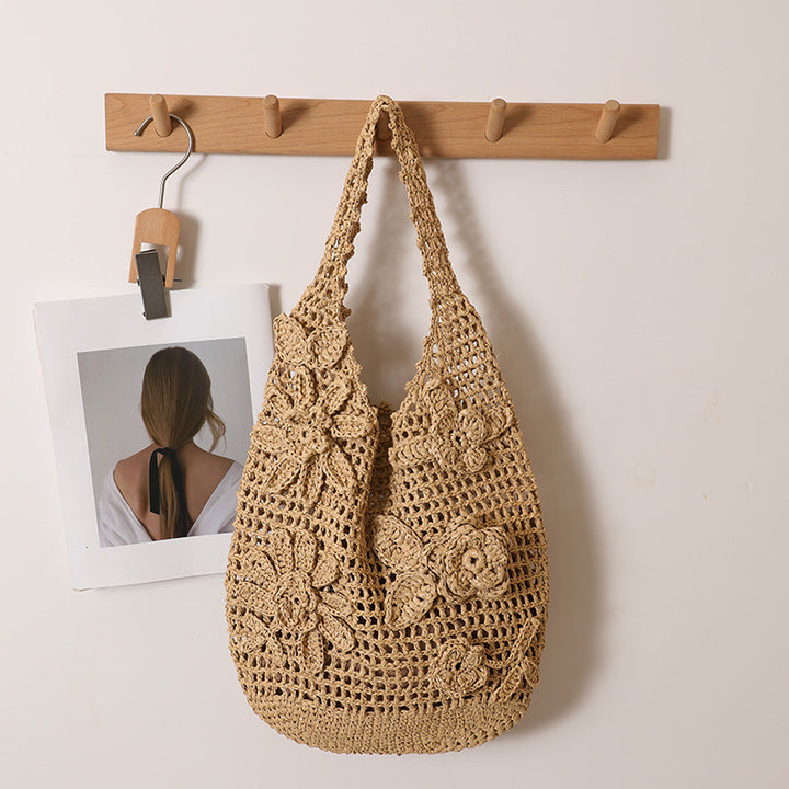 Crocheted shoulder bag with floral appliqués Bowlift