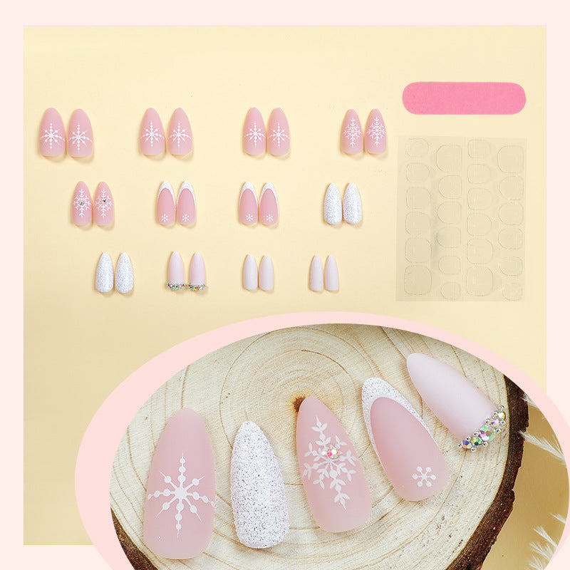Elegant Press-On Nail Set with Winter Snowflake Designs Bowlift