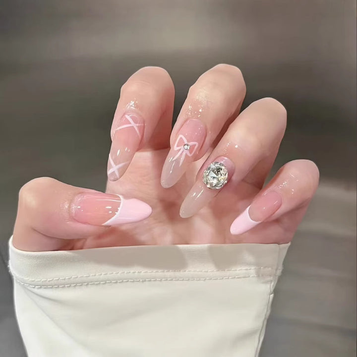 Artistic Press-On Nail Set with Floral and Gemstone Accents Bowlift
