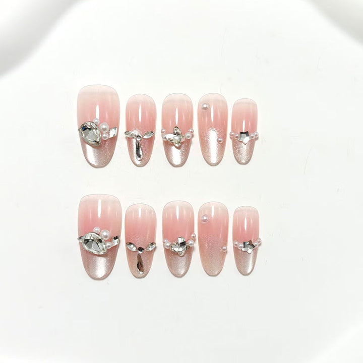 Artificial nails with luxurious jewelry accents Bowlift