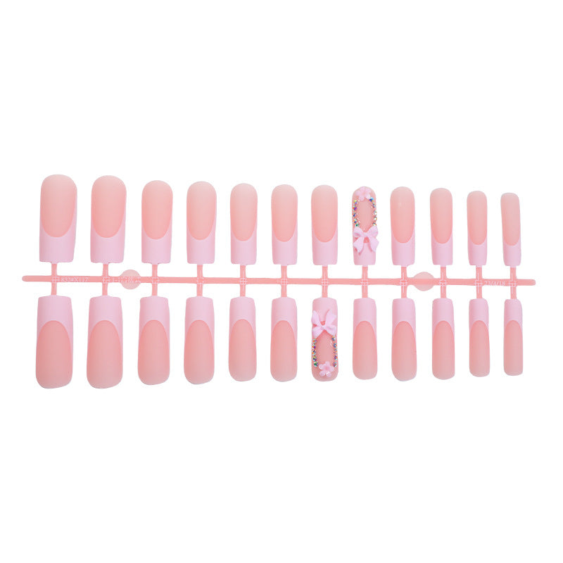 Decorative Press-On Nail Art with Floral and Bow Accents Bowlift