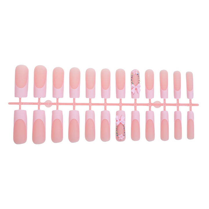 Decorative Press-On Nail Art with Floral and Bow Accents Bowlift