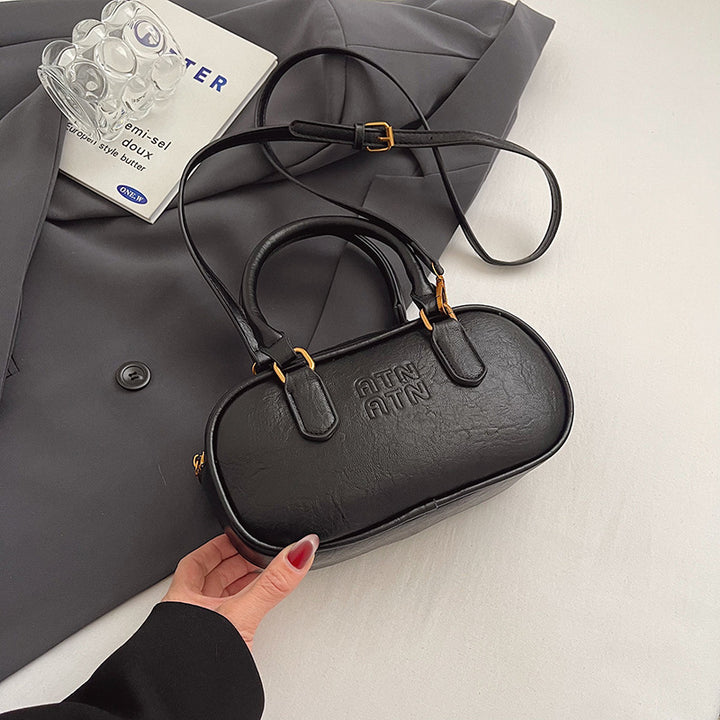 Textured Mini Handbag Bowlift